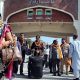 Indian pilgrims to historical Hindu temple in Karak