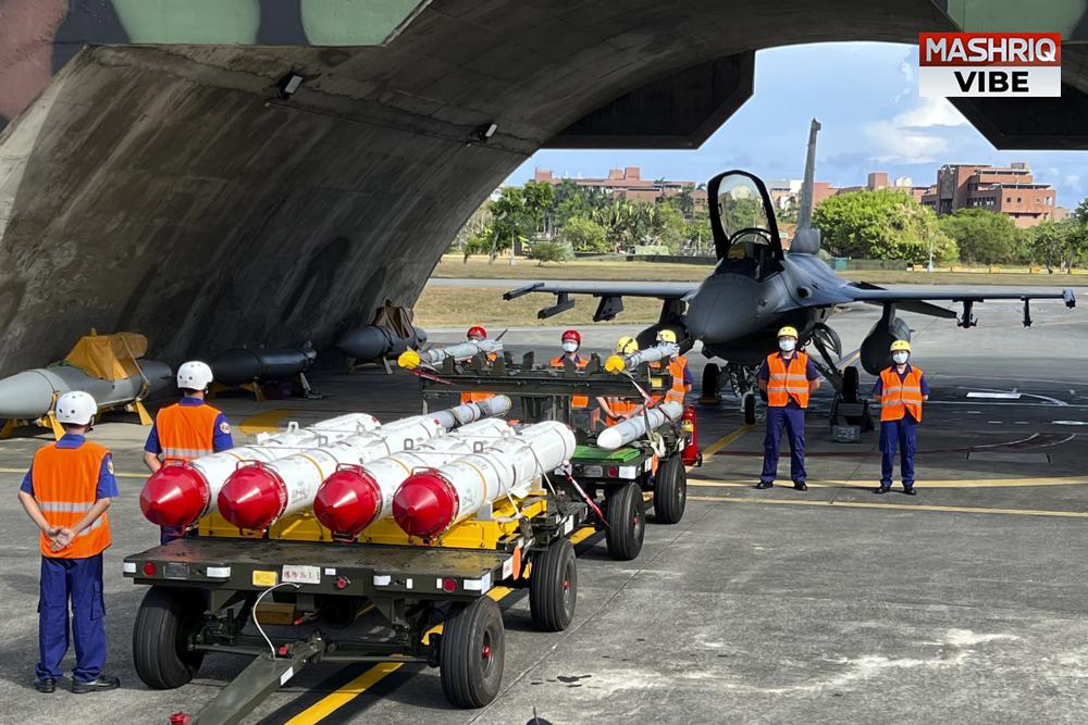 Taiwan China hold opposing military drills